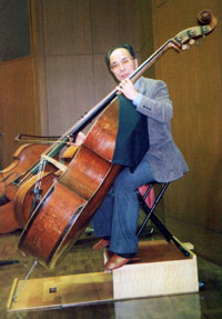 with his contrabass